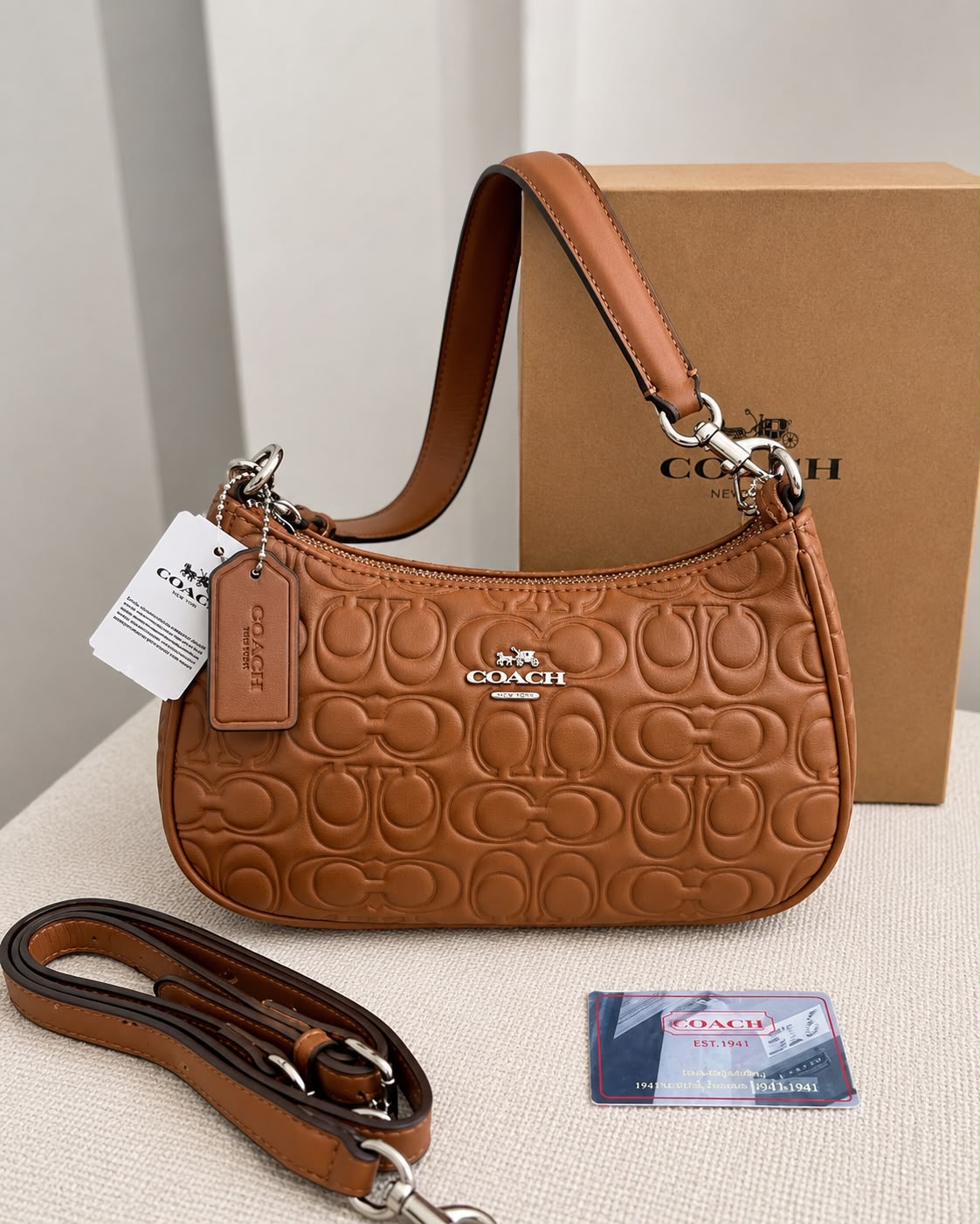 BOLSO COACH CAMEL