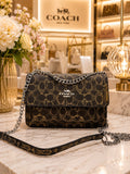 BOLSO COACH OSCURO