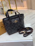 BOLSO COACH NEGRO