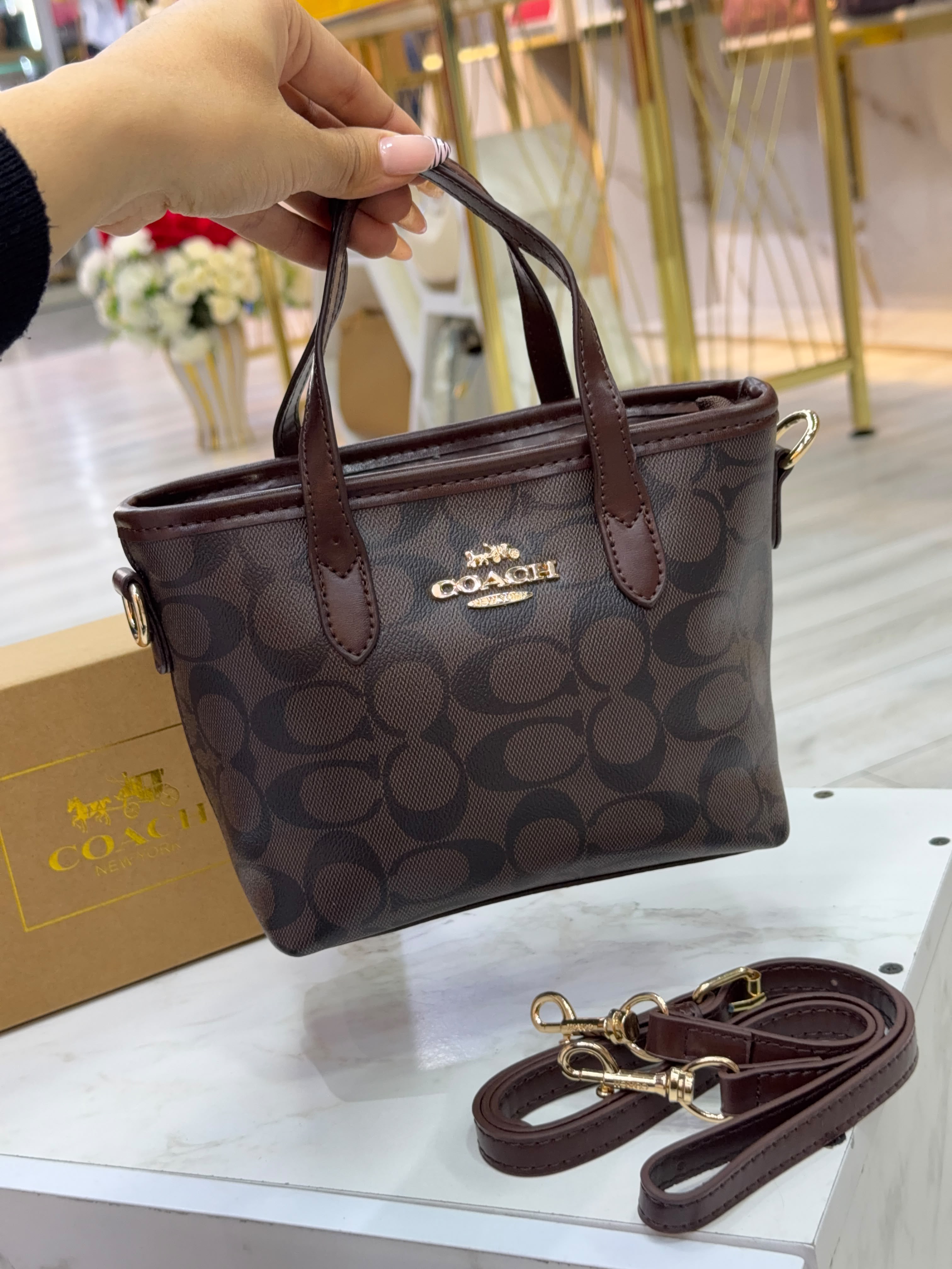 BOLSO COACH CAFÉ